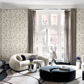 Beautiful wallpaper with monograms in a two-room apartment