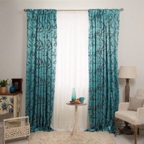 Turquoise curtains on a metal cornice