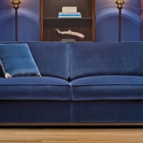 Blue sofa with fabric upholstery