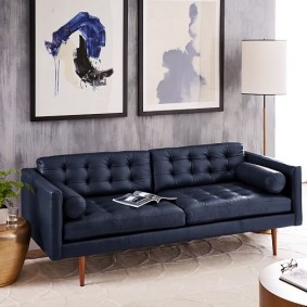 Chân gỗ bằng ghế sofa màu xanh
