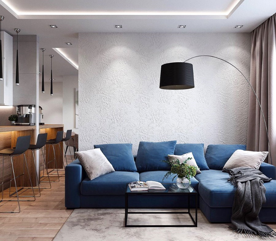 Living room lighting with blue sofa