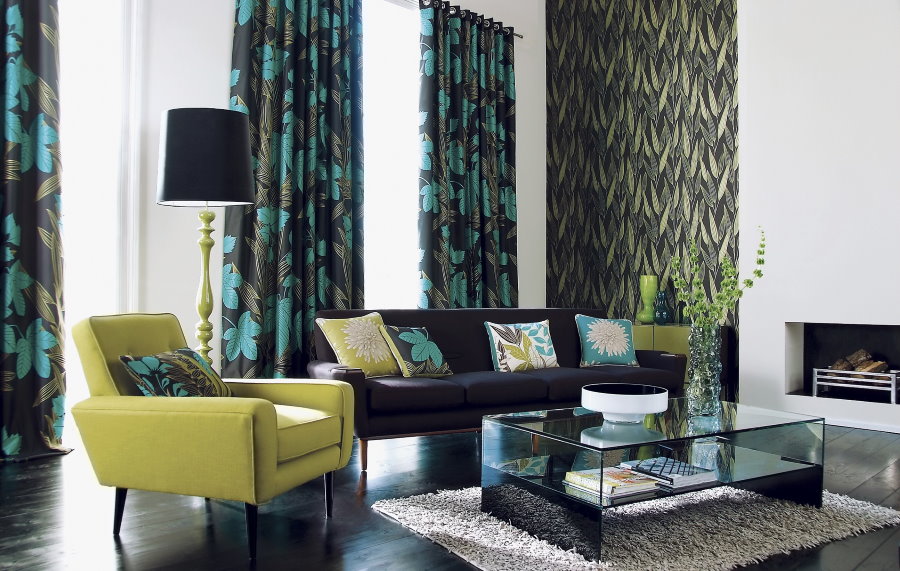Green curtains in the living room with dark floor