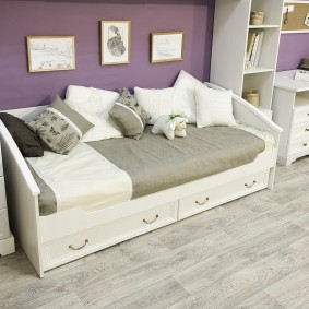 White bed with drawers