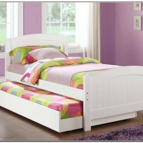 White wooden bed