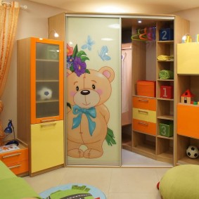 Corner wardrobe in the interior of the nursery