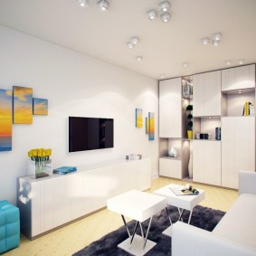 Light furniture in a room with a white ceiling