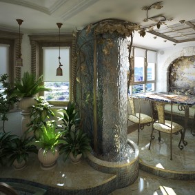 Indoor garden with decorative waterfall on the wall