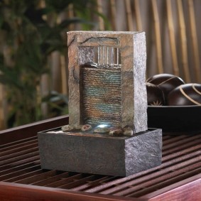 Miniature fountain made of natural stone