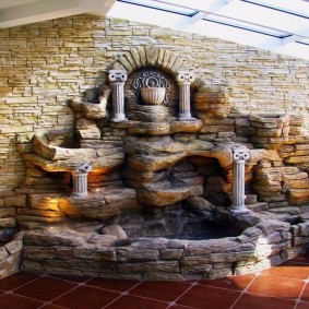 Stone waterfall in the lobby of a private house