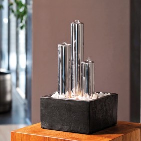 Compact fountain for a high-tech living room