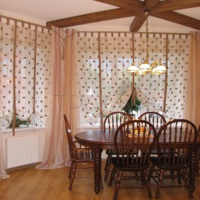 Simple curtains on the windows of the living room