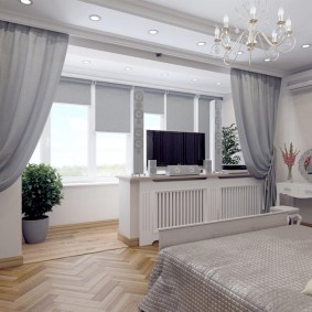Zoning the bedroom with blackout curtains