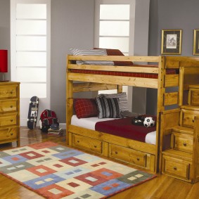Wooden bed in a room of two boys