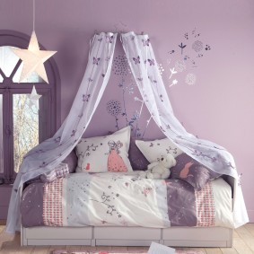 Children's bed near the lilac wall