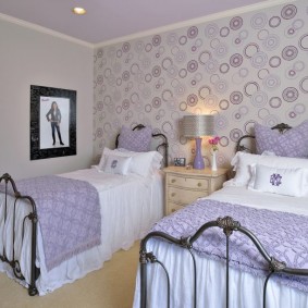 Lilac wallpaper in the bedroom of two girls