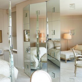 Mirrored casement screens in the bedroom