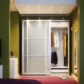 Sliding wardrobe with glass doors