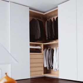 Men's clothing in a large closet
