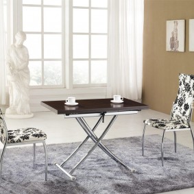 Stylish table with chromed legs