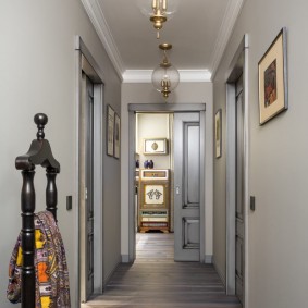 Long corridor in a brick house apartment