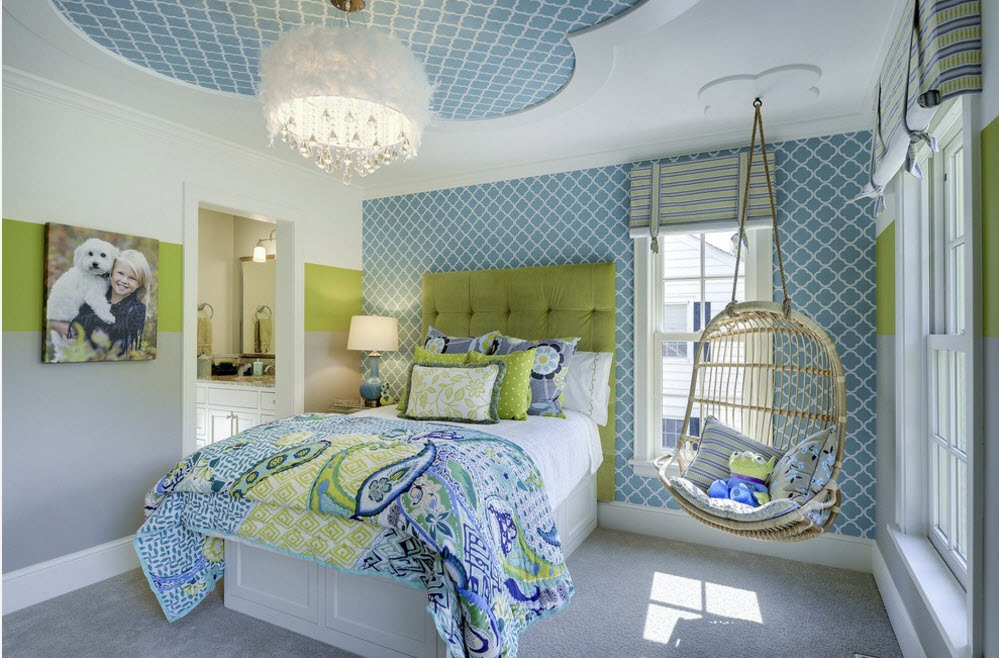 Blue wallpaper in the bedroom of a schoolboy boy