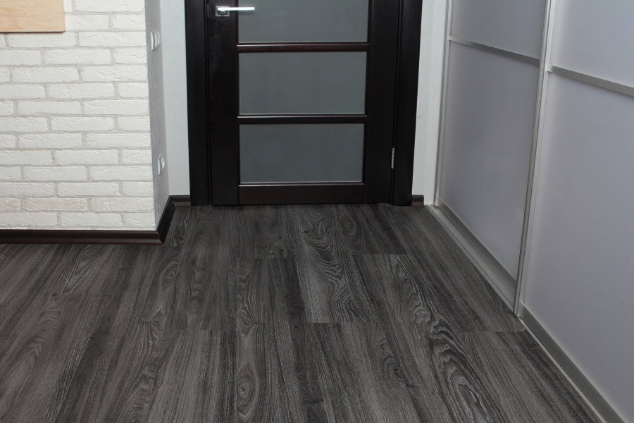 Gray laminate in the hallway with wardrobe