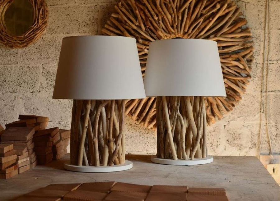 Lamps from tree branches for the decor of the living room in the country
