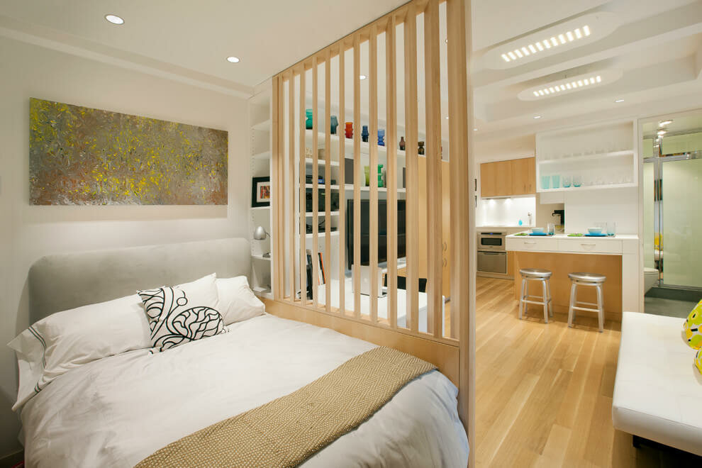 Decorative partition from slats in a studio apartment