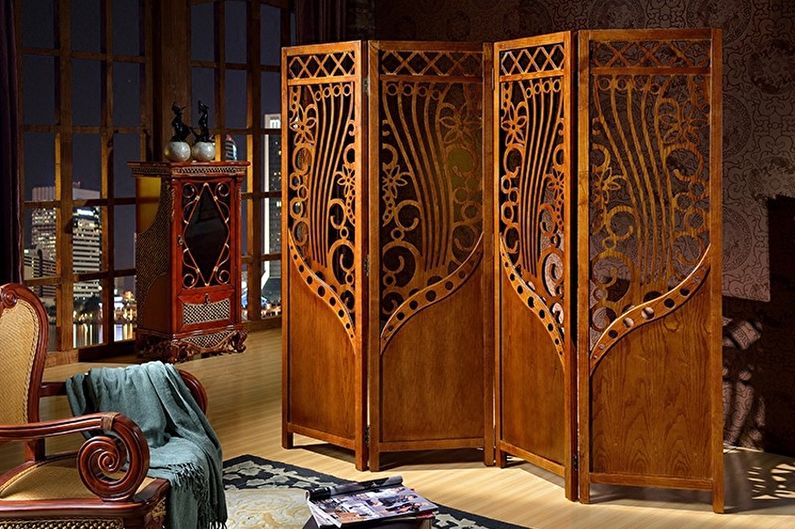 Folding screen made of solid wood in the interior of the hall