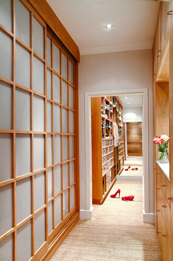 Sliding wardrobe with glass inserts on a wooden frame